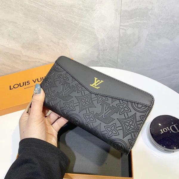 Louis Vuitton Wallet Made of Leather Embossed with the Brand's Logo